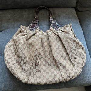 GUCCI
GG Canvas Pelham Shoulder Bag